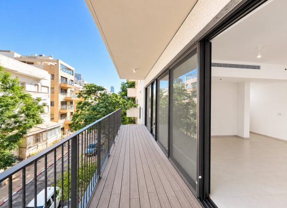 Private terrace overlooking a quiet residential street in central Tel Aviv.